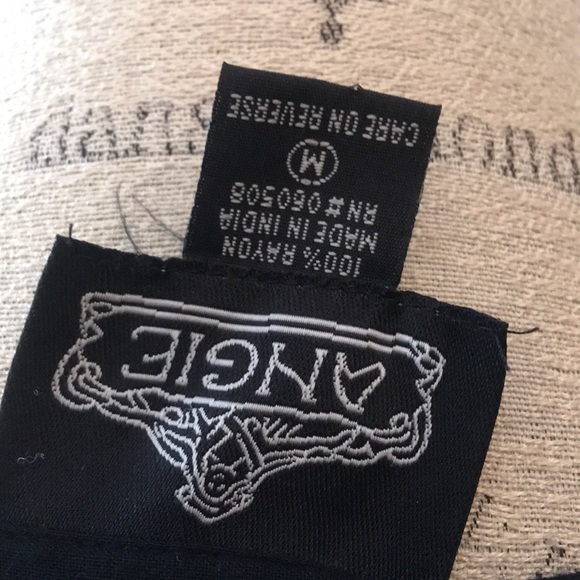 Angie flirty black dress! Embroidered top and hem. - Picture 5 of 8